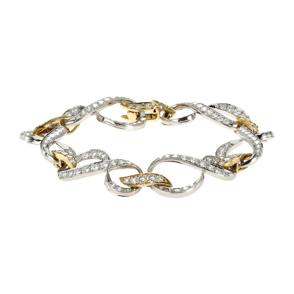 Infinity Bracelet
4.31ctw
Platinum + 18K Yellow Gold