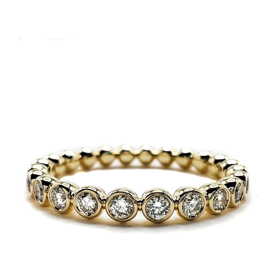Bezel Set Diamond Ring
18K Yellow Gold